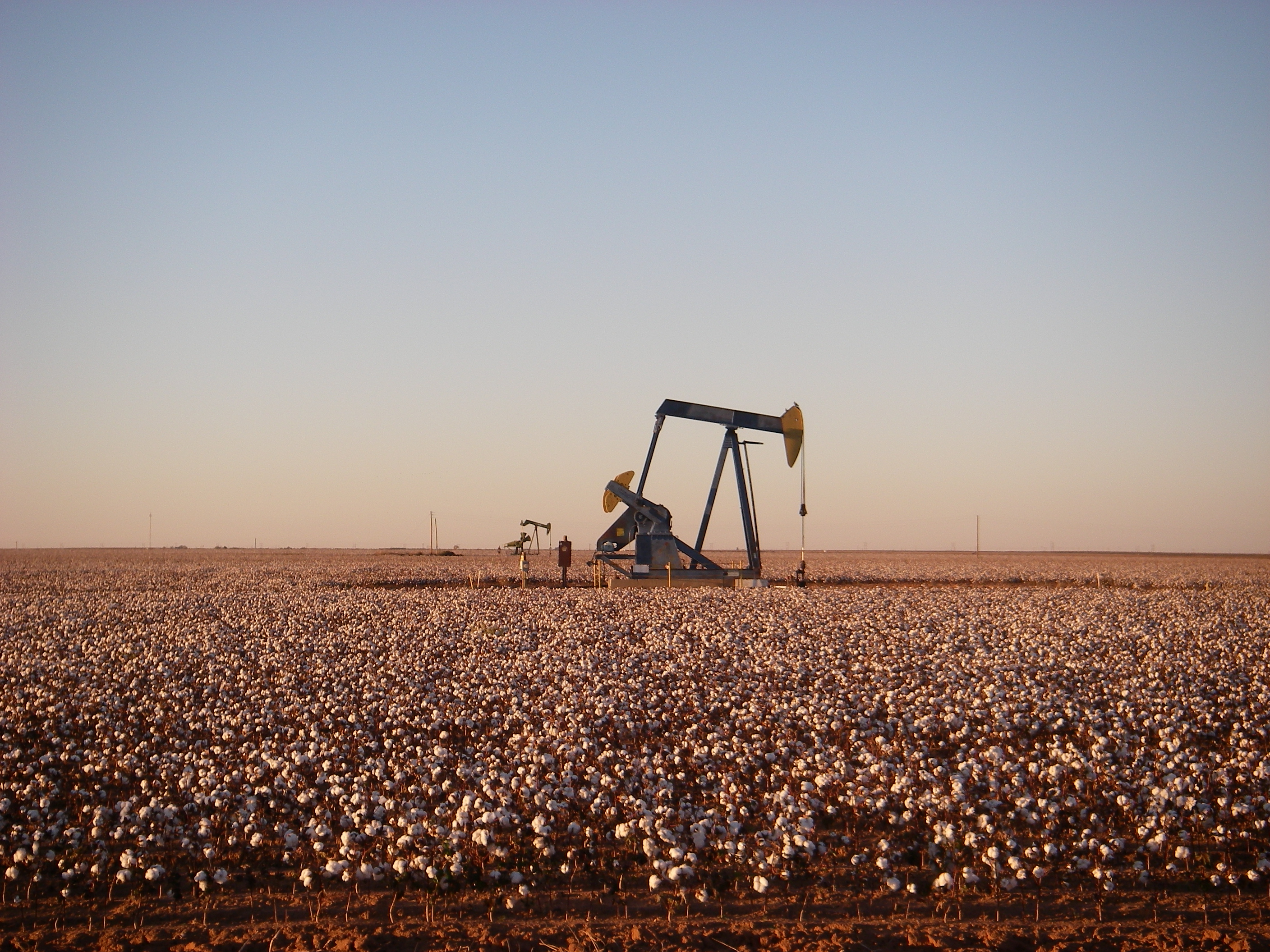 An oil pumpjack on dry ground east of Andrews, Texas