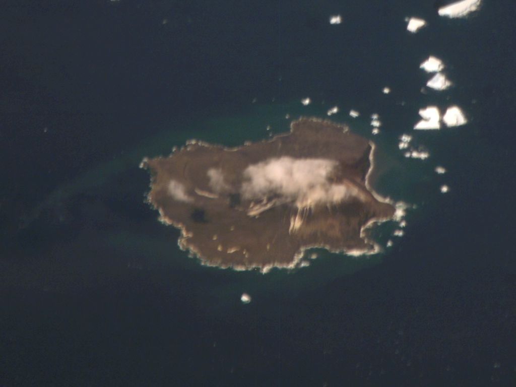 The volcano and slopes of Zavodovski Island surrounded by ocean.